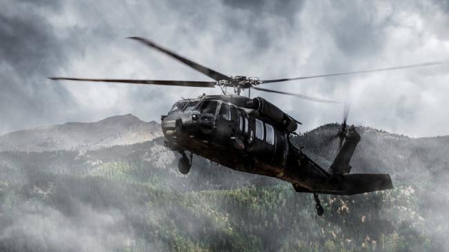 Military helicopter in flight