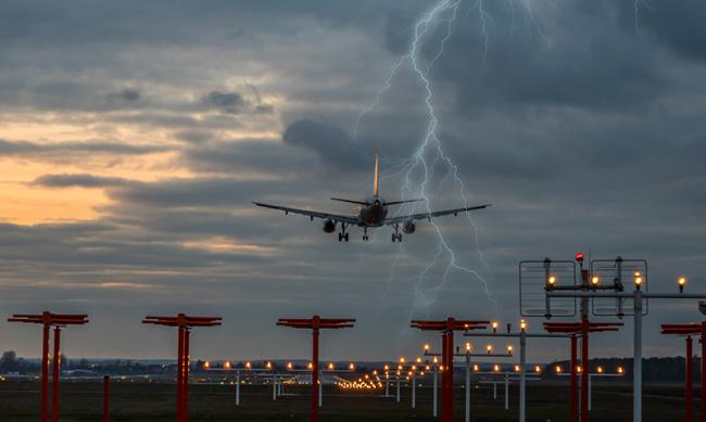 Airplane landing in lightning