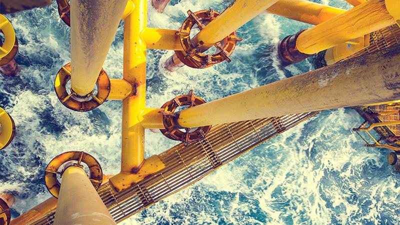 Oil rig pipes leading to sea
